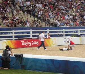 The rider lay motionless for what seemed forever (probably about 5 minutes) before finally getting up and being helped to the ambulance. The announcer provided updates throughout the rest of the competition and last I heard he was checked out at the hospital with injuries to his hand.
